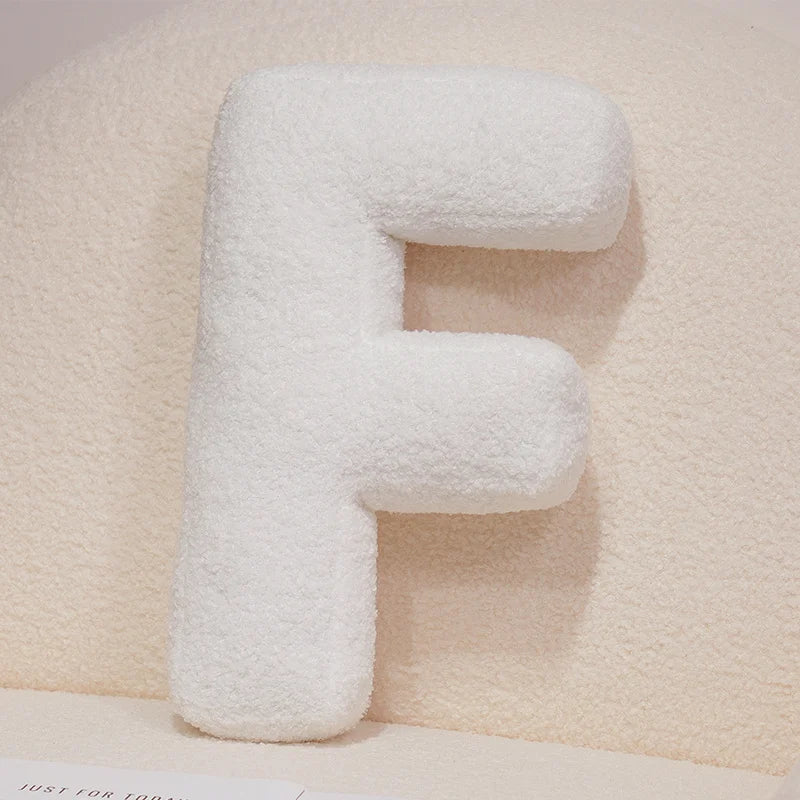 Coussins lettres blancs tout doux