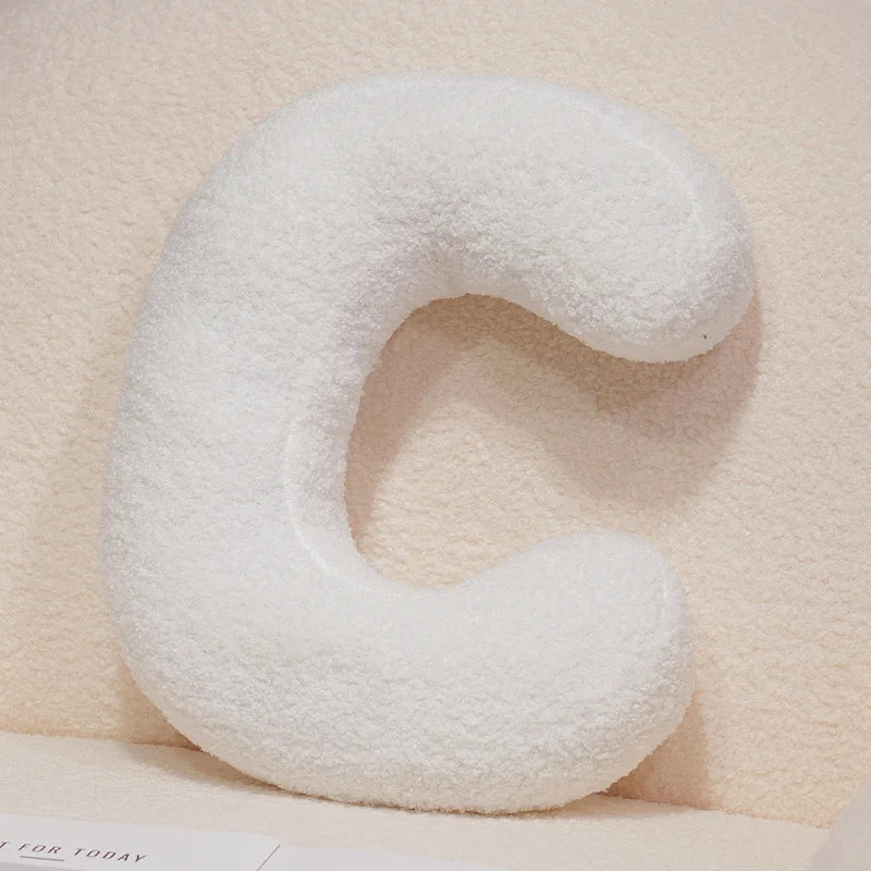 Coussins lettres blancs tout doux