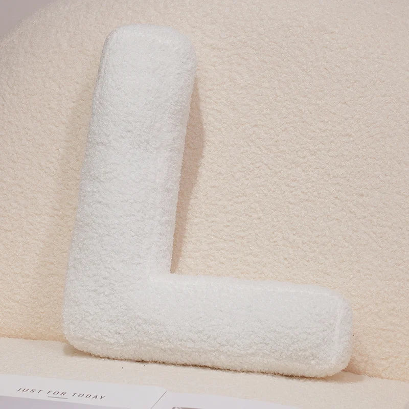 Coussins lettres blancs tout doux