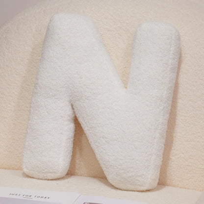 Coussins lettres blancs tout doux