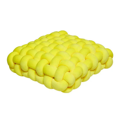 Coussin carré tressé