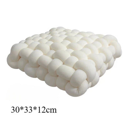 Coussin carré tressé