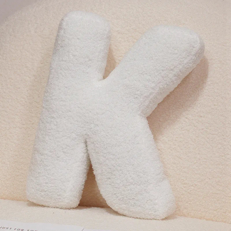 Coussins lettres blancs tout doux