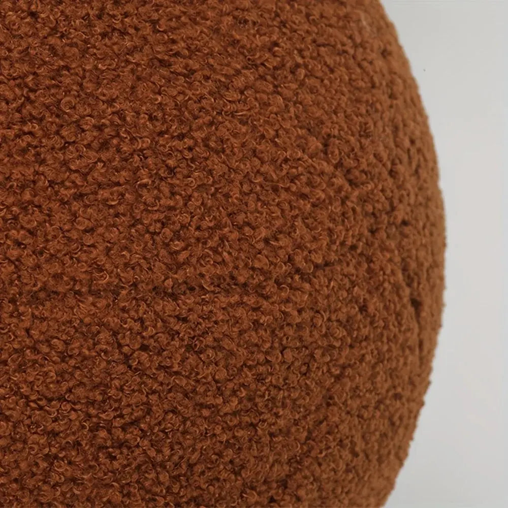 Coussins ronds en tissu bouclé