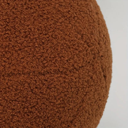 Coussins ronds en tissu bouclé