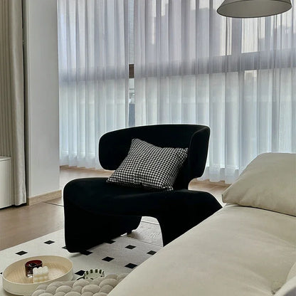Fauteuil design en tissu – Structure en fer noir, style moderne et luxueux