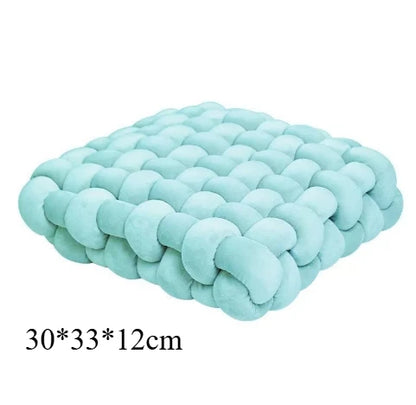 Coussin carré tressé
