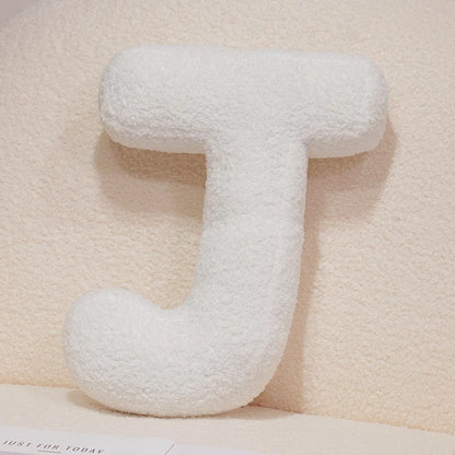 Coussins lettres blancs tout doux
