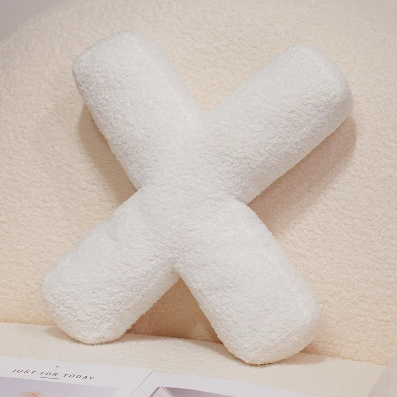 Coussins lettres blancs tout doux
