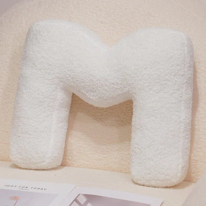 Coussins lettres blancs tout doux