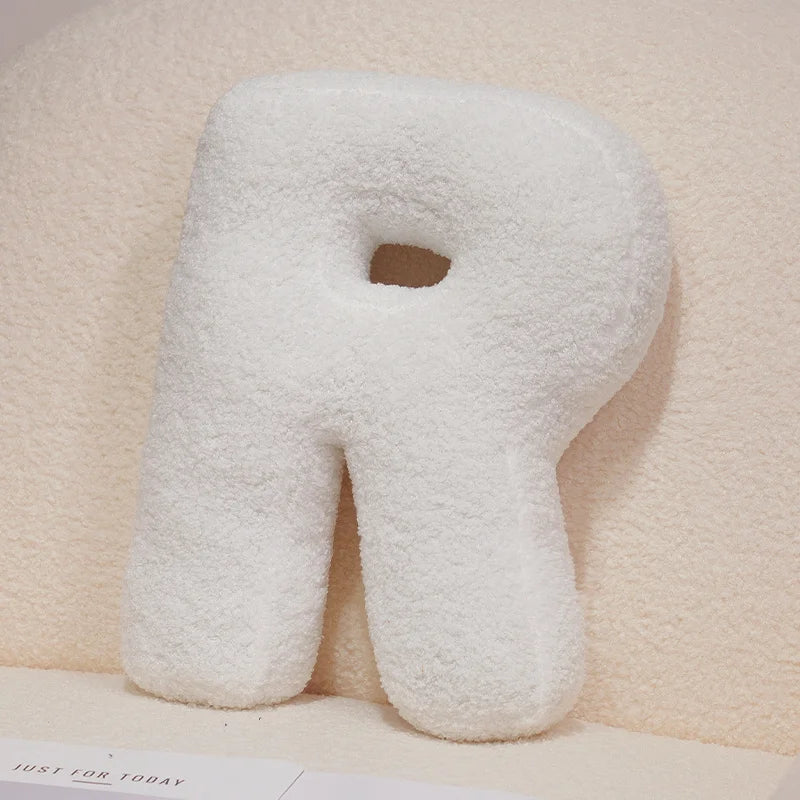 Coussins lettres blancs tout doux