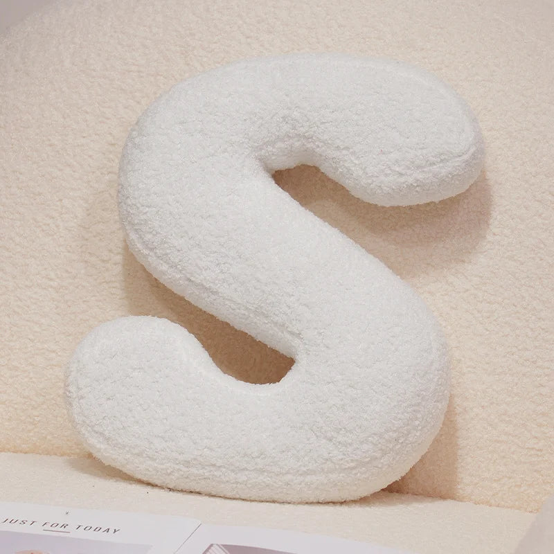 Coussins lettres blancs tout doux