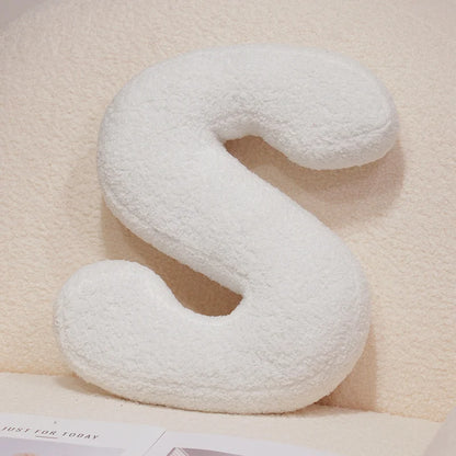 Coussins lettres blancs tout doux