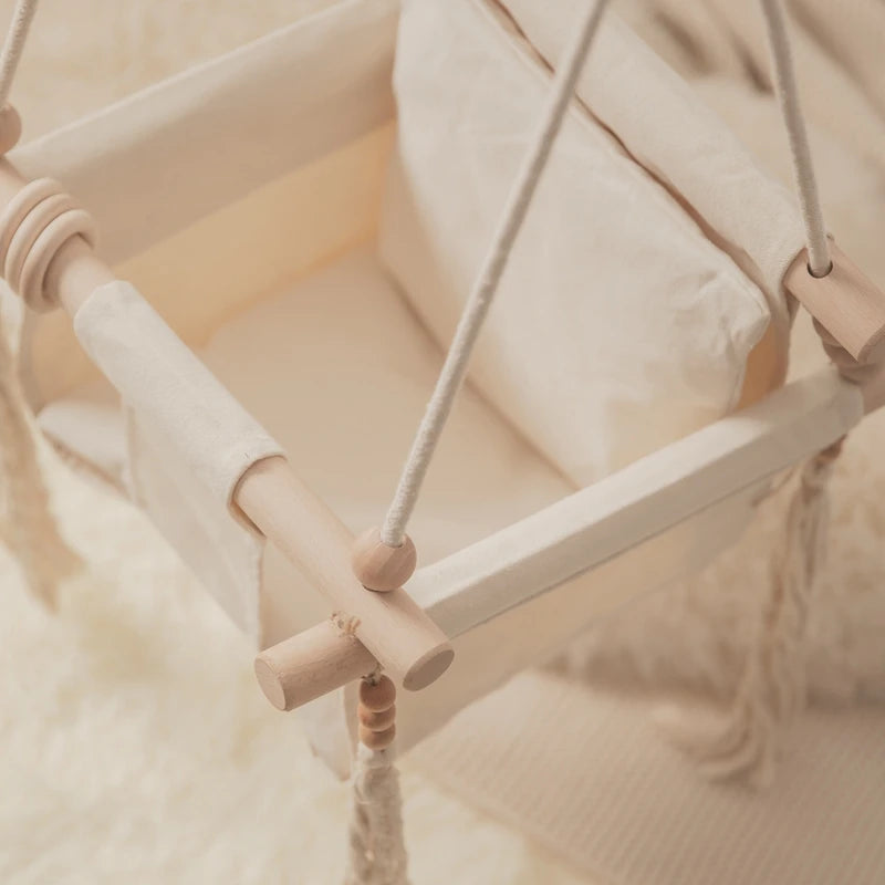 Chaise balançoire en bois pour enfants