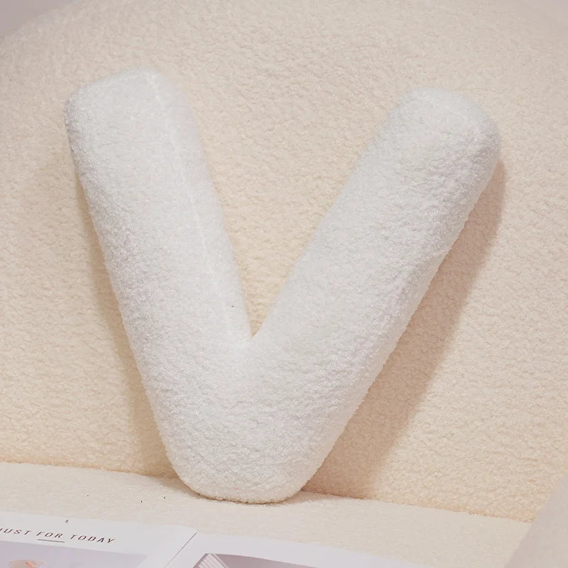 Coussins lettres blancs tout doux