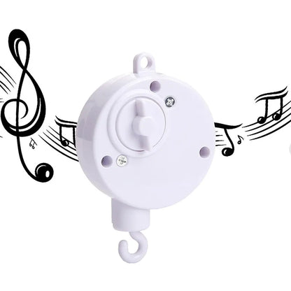 Mobile musical pour lit bébé