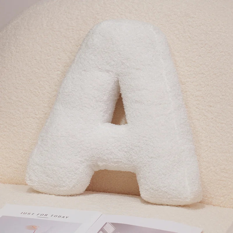 Coussins lettres blancs tout doux