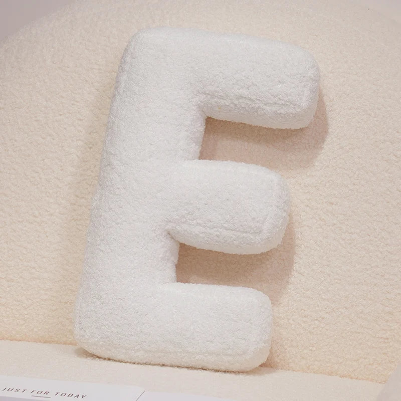 Coussins lettres blancs tout doux