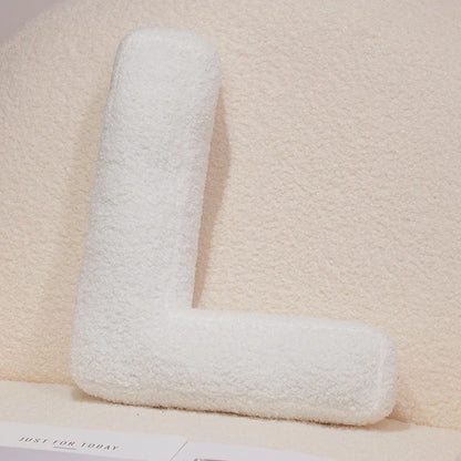 Coussins lettres blancs tout doux