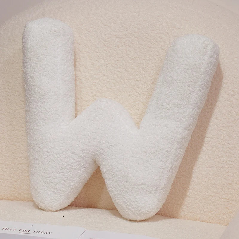 Coussins lettres blancs tout doux