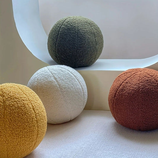 Coussins ronds en tissu bouclé