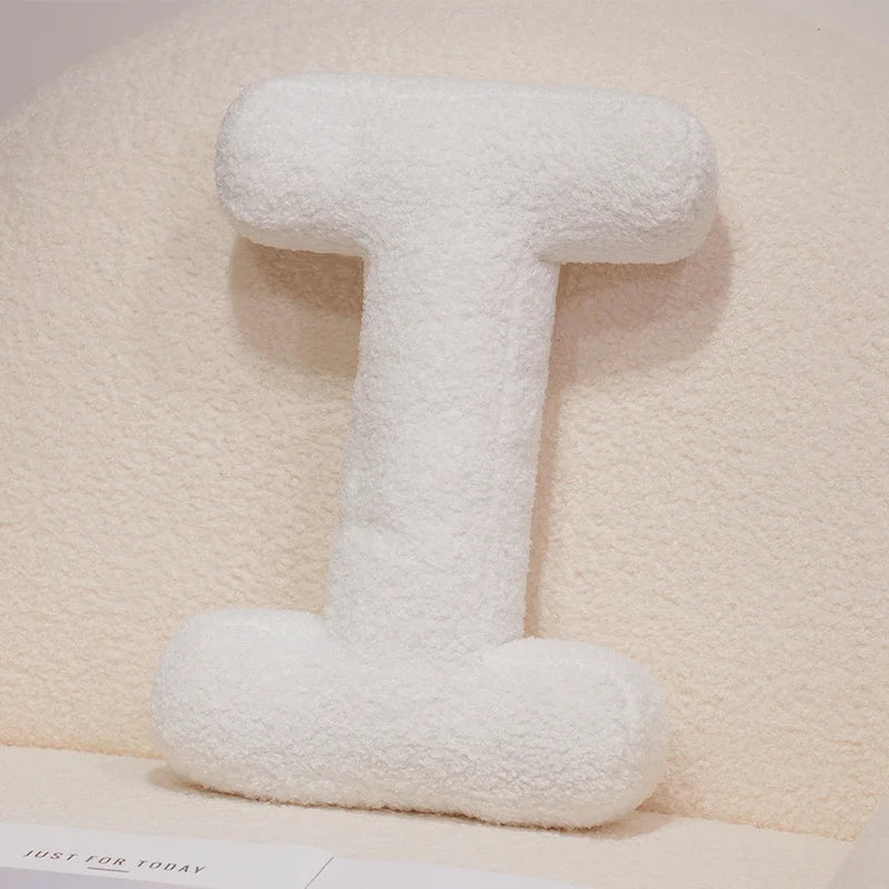 Coussins lettres blancs tout doux