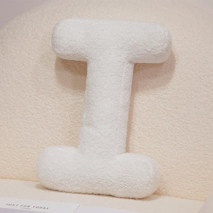 Coussins lettres blancs tout doux